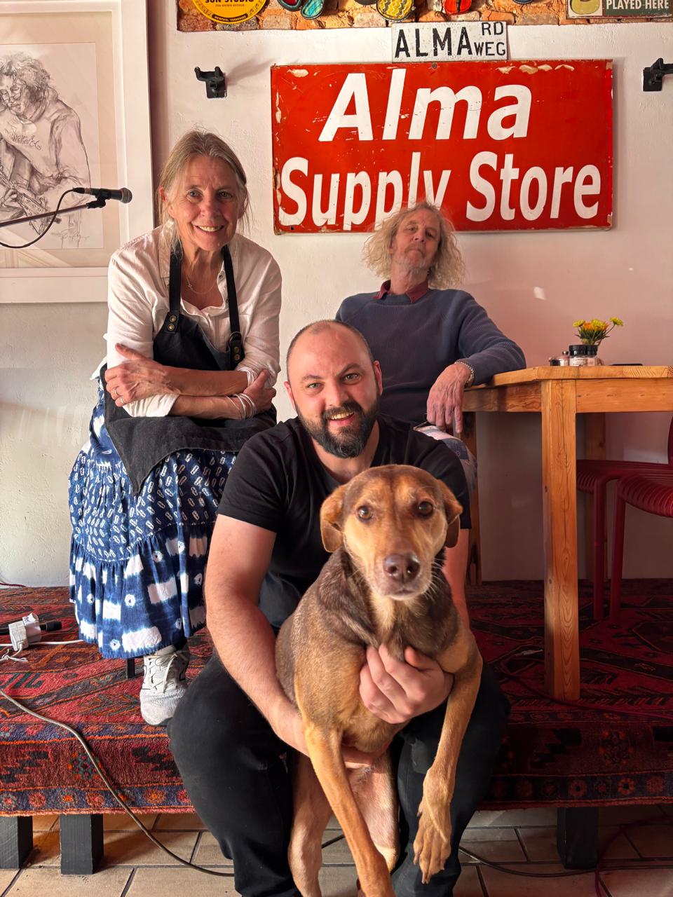 Alma Cafe Family - Retha, Richard, Jono - and the dog who runs the door.